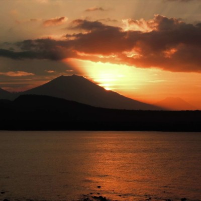 Sunset on the Mountains in Menjangan, Drone View thumbnail